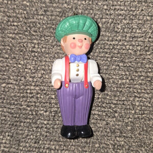 1998 Hallmark Miniature Christmas Ornament Boy Green Hat Purple Pants 2.5"